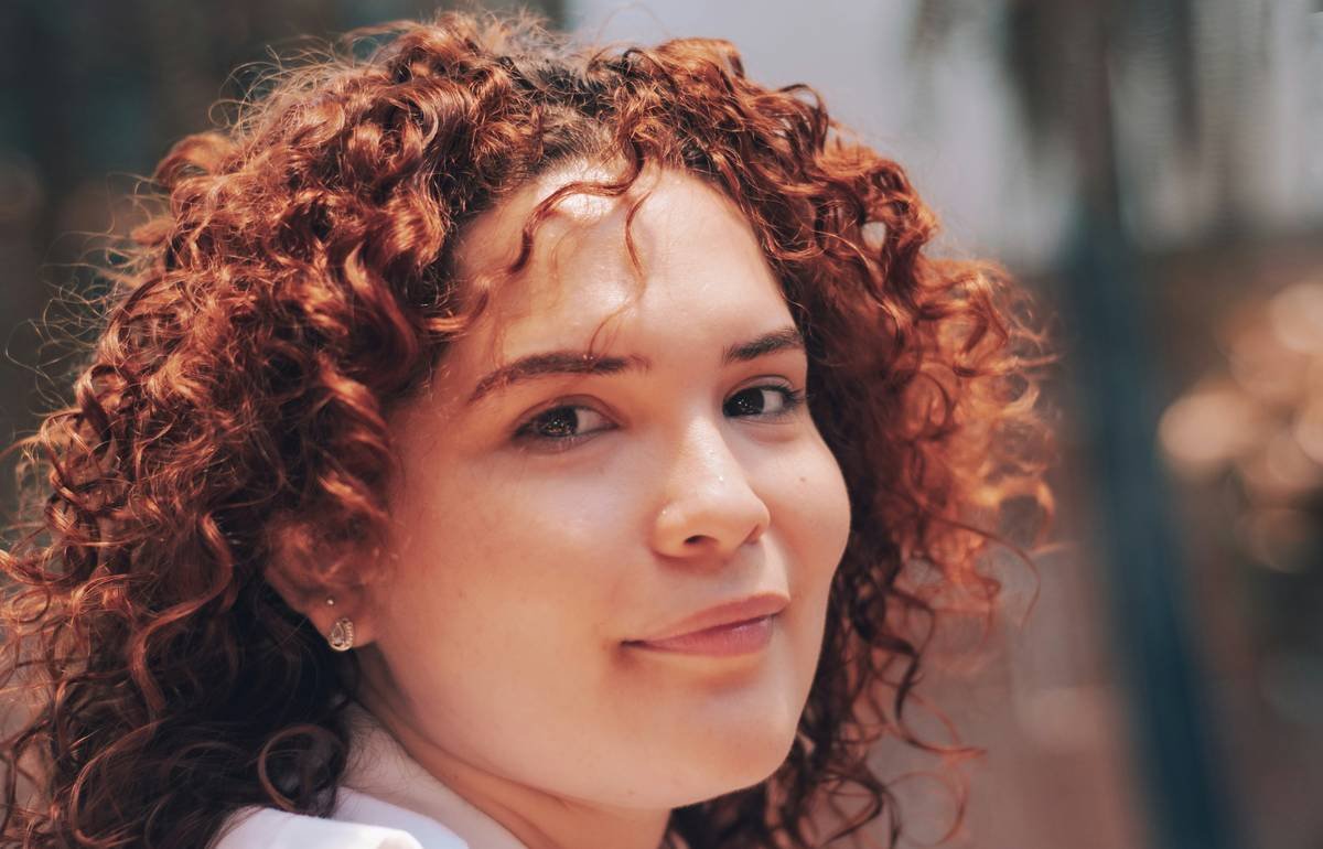 Before: flat, frizzy 4B hair. After: lifted roots with separated, shiny curls using proper hair pick technique