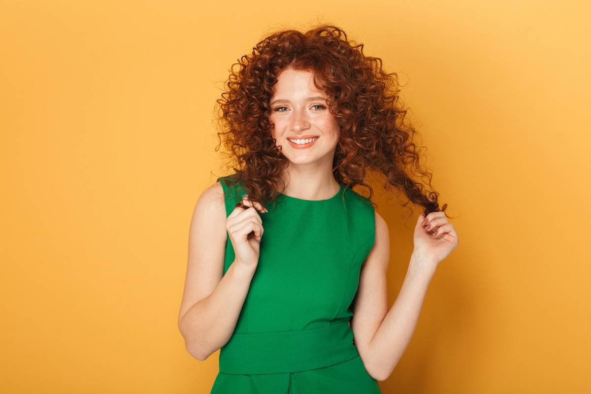 Side-by-side comparison of three styling hair picks: wide-tooth metal, ergonomic plastic, and vintage wooden pick with labeled prong spacing and material types