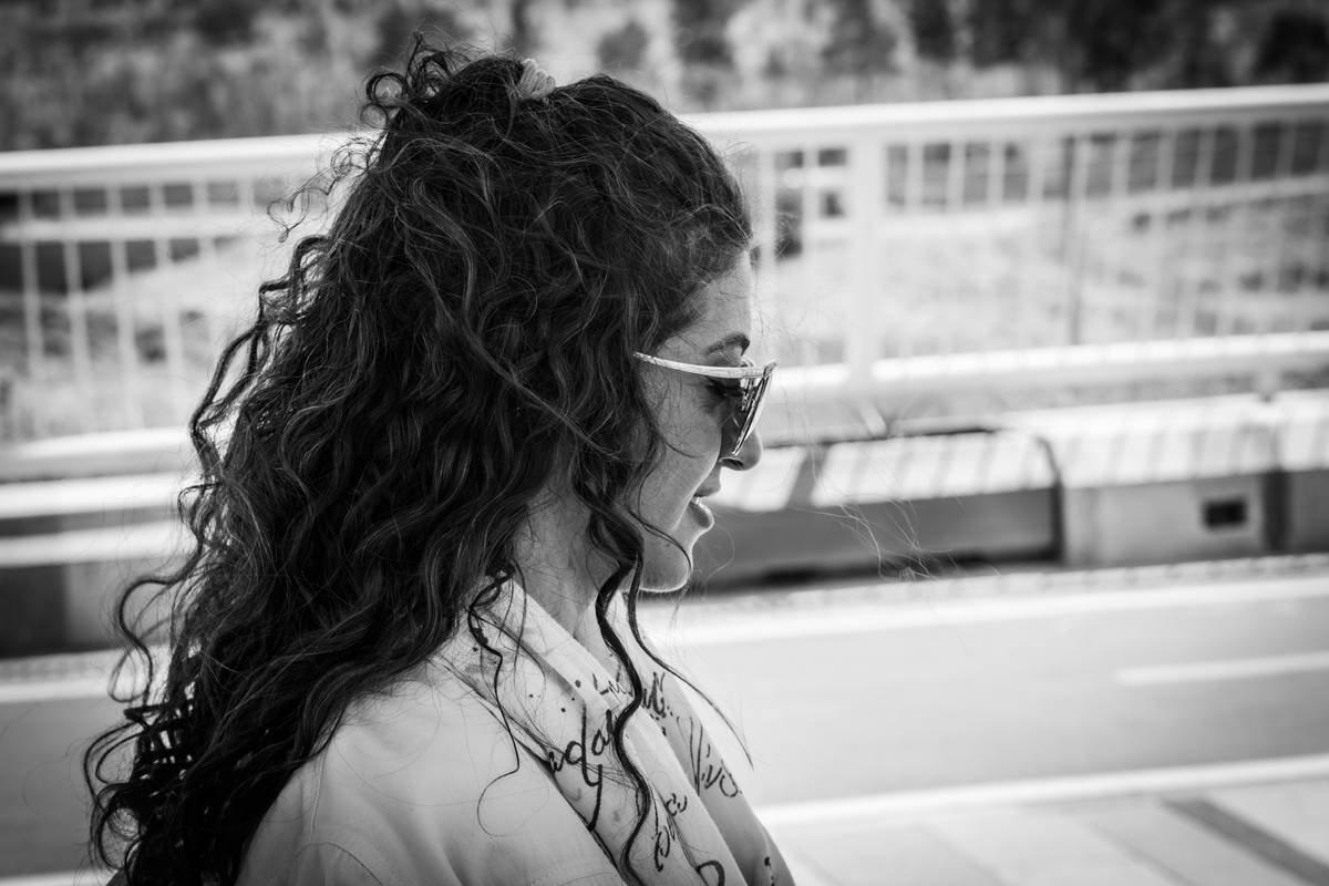 Stylish woman wearing a decorative hair pick as part of her hair pick fashion ensemble
